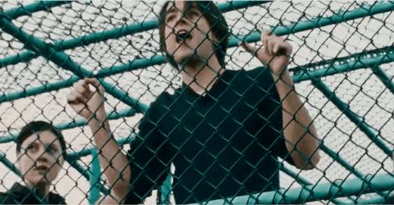 nick screaming through a fence