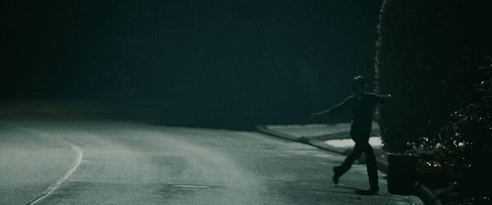 nick kicking over a trash can